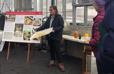 Molly Quade giving presentation about Metarhizium